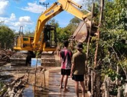 Percepat Proyek Jalan TMMD, Satgas Kodim 1012/Btk Gunakan Alat Berat